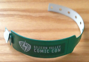 Spiffy wristband with RFID chip so you can tap in/out of the con and there's an accurate count of people in the venue